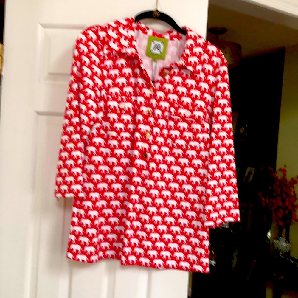 Ladies shirt. 3/4 sleeve and 3/4 button down the front. 92 % nylon & 8%elastane